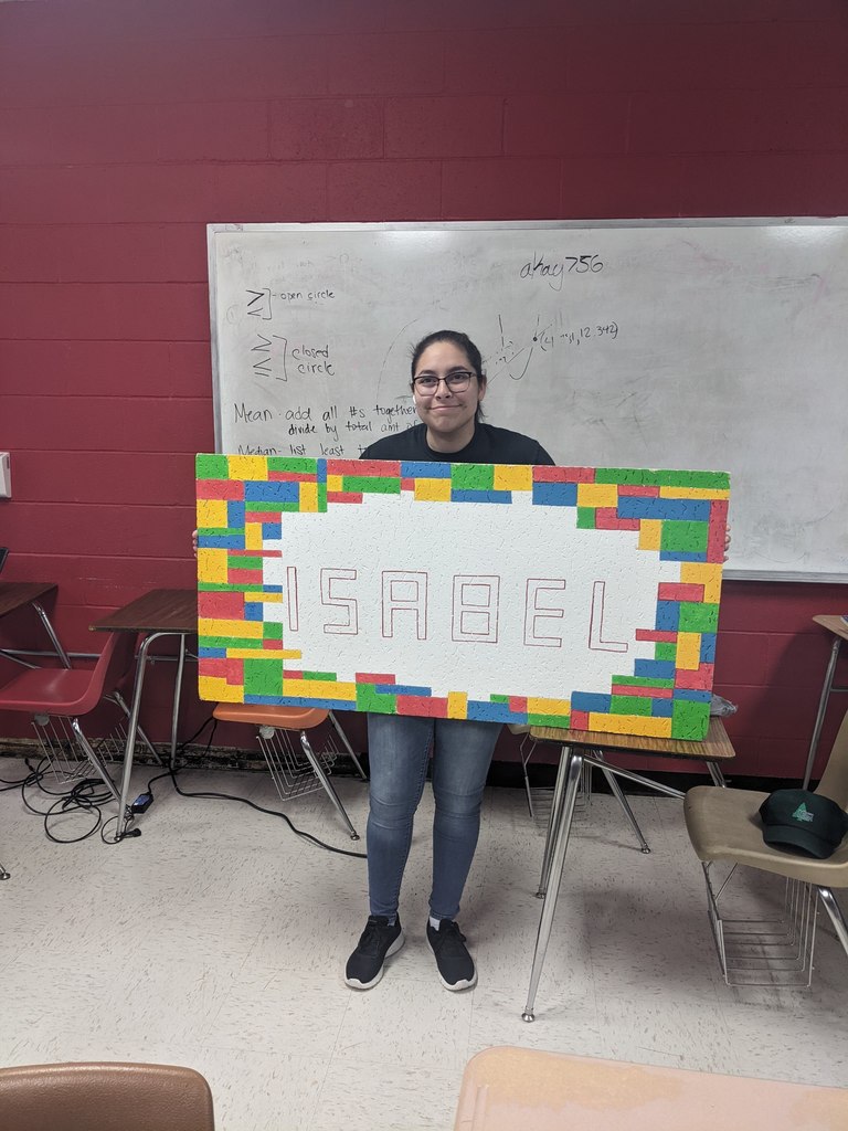 Isabel loves legos so her ceiling tile features colorful bricks.